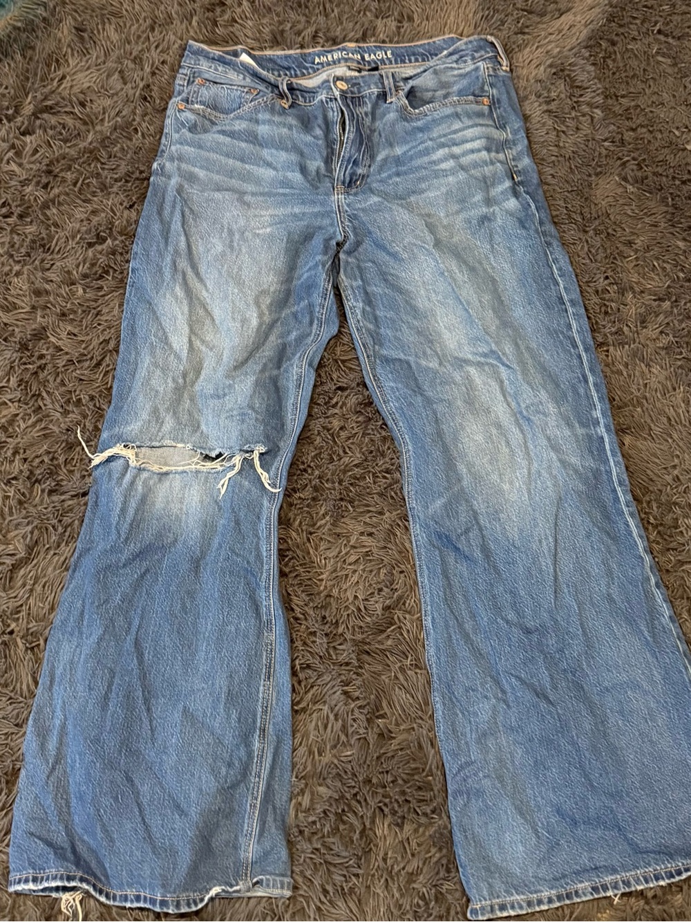 American Eagle Outfitters Faded Blue Wide Leg Jeans with Knee Rip